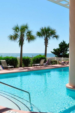 View of outdoor hot tubs and pool at Blue Water Keyes