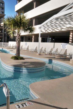 Outdoor tanning deck at Blue Water Keyes with oceanfront views